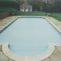 Automatic covered pool